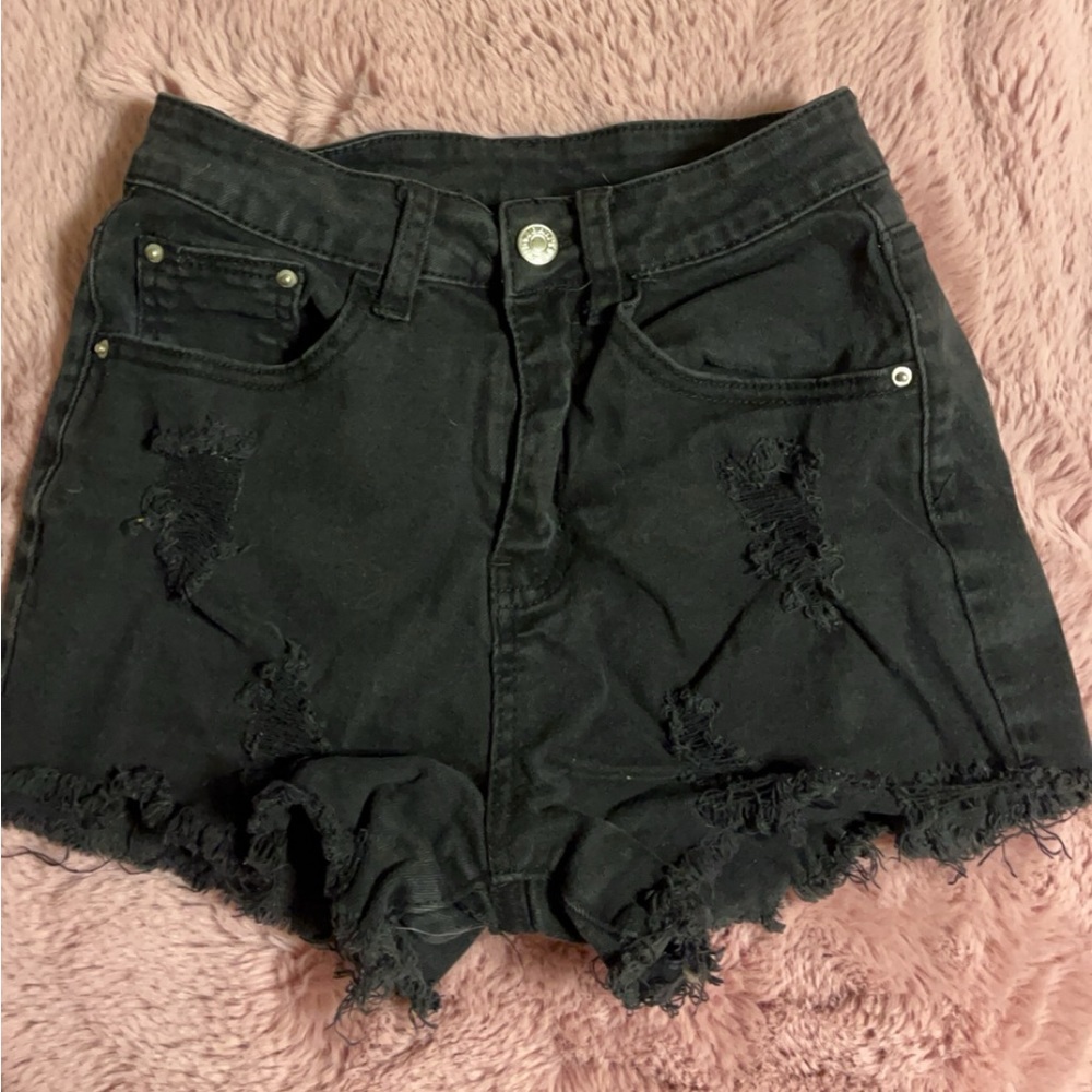 High waisted black jean shorts.